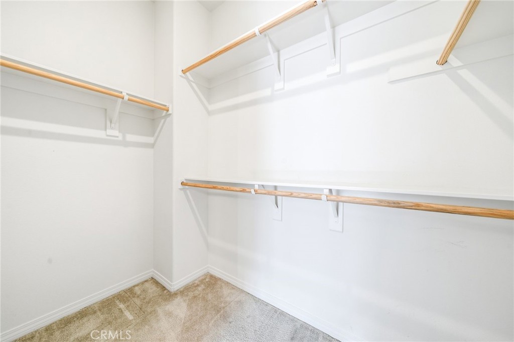 11130 Legion Loop, Unit 105 El Monte, CA 91731 - Photo 25 of 49 a view of a room with racks on the wall