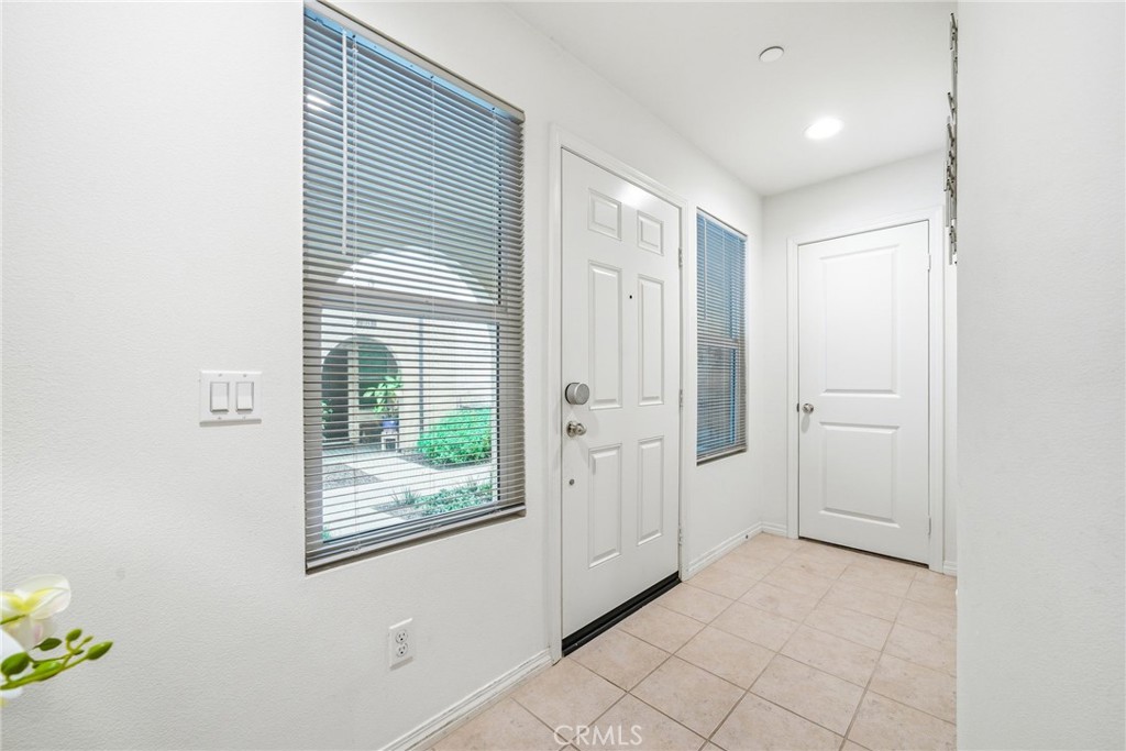 11130 Legion Loop, Unit 105 El Monte, CA 91731 - Photo 3 of 49 a view of a livingroom with an empty space and a window