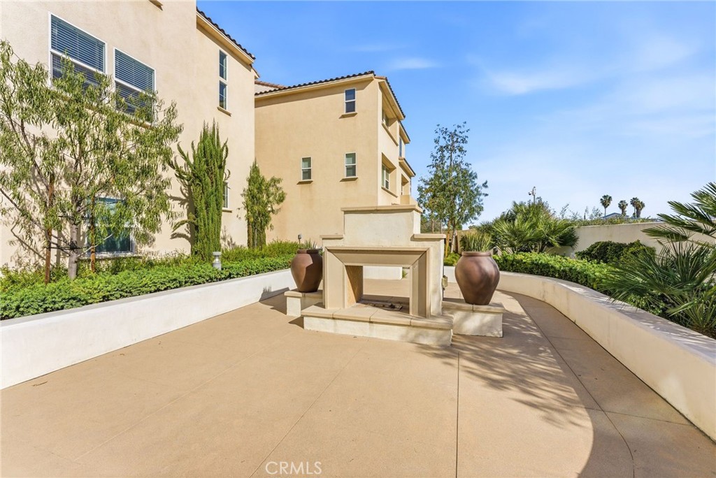 11130 Legion Loop, Unit 105 El Monte, CA 91731 - Photo 40 of 49 a bench is sitting in front of a building