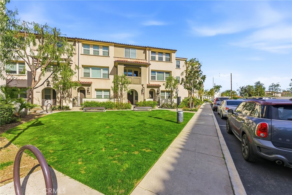 11130 Legion Loop, Unit 105 El Monte, CA 91731 - Photo 43 of 49 a view of a car park in front of a building
