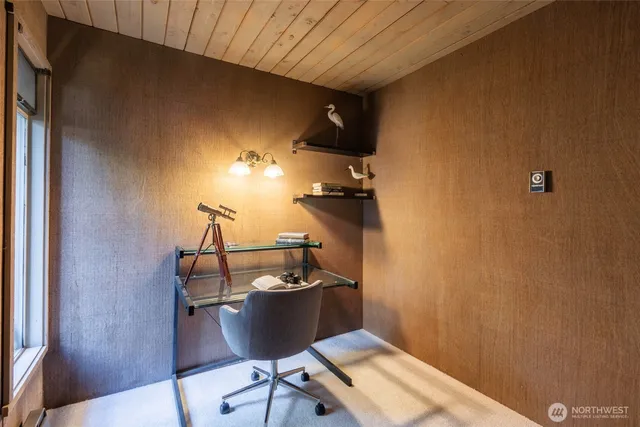 a room with a table and chairs