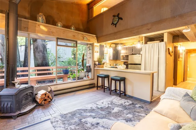 a room with furniture and a large window