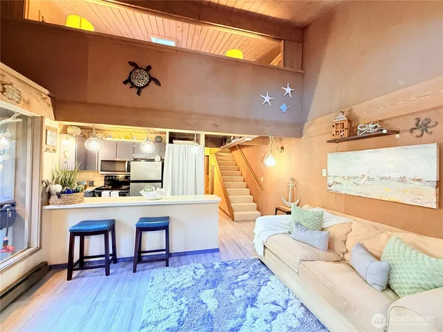 a living room with a couch and a table