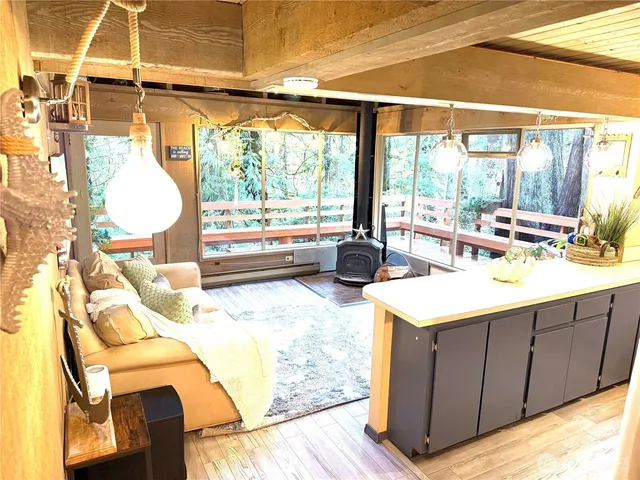 a kitchen with a sink and wooden cabinets