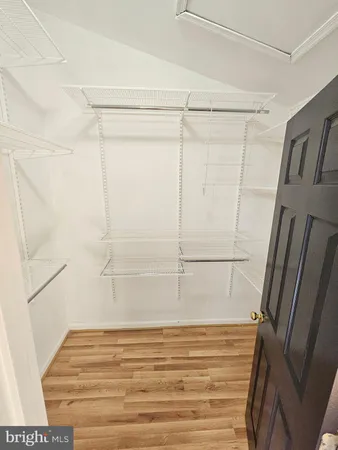 a view of a room with racks on the wall