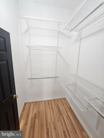 a bathroom with a sink toilet a mirror and tub