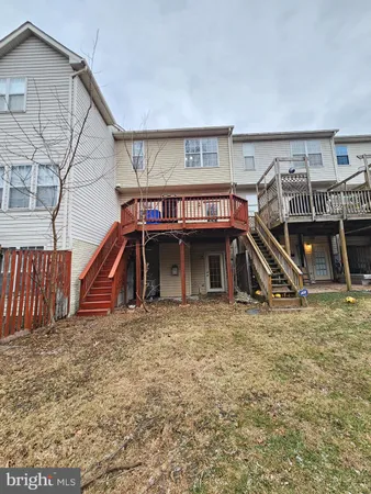 a view of a house with large windows