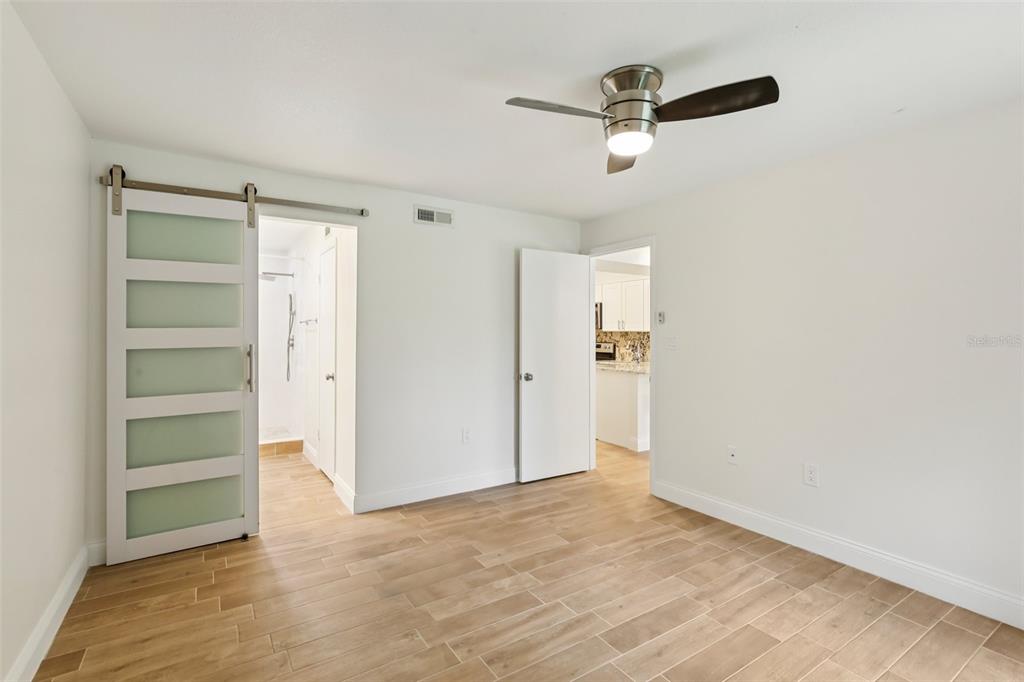 2407 Cypress Pond Road, Unit 2407 Palm Harbor, FL 34683 - Photo 15 of 28 a view of empty room with ceiling fan