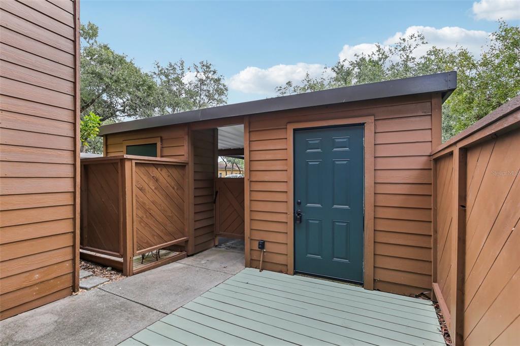 2407 Cypress Pond Road, Unit 2407 Palm Harbor, FL 34683 - Photo 4 of 28 a view of a house with a garage