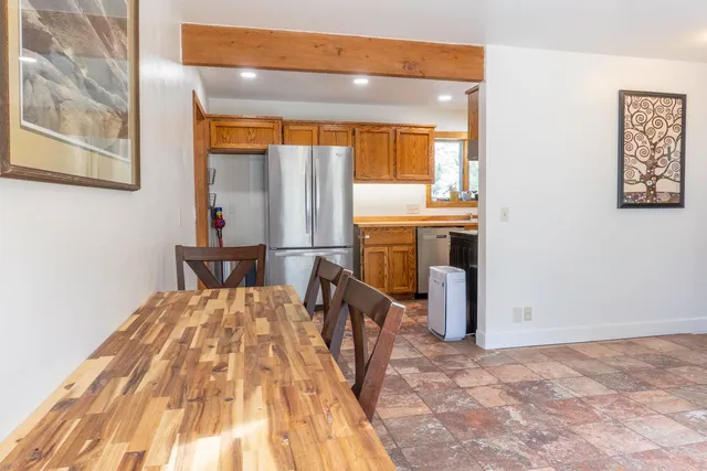 a bed room with a bed and a window