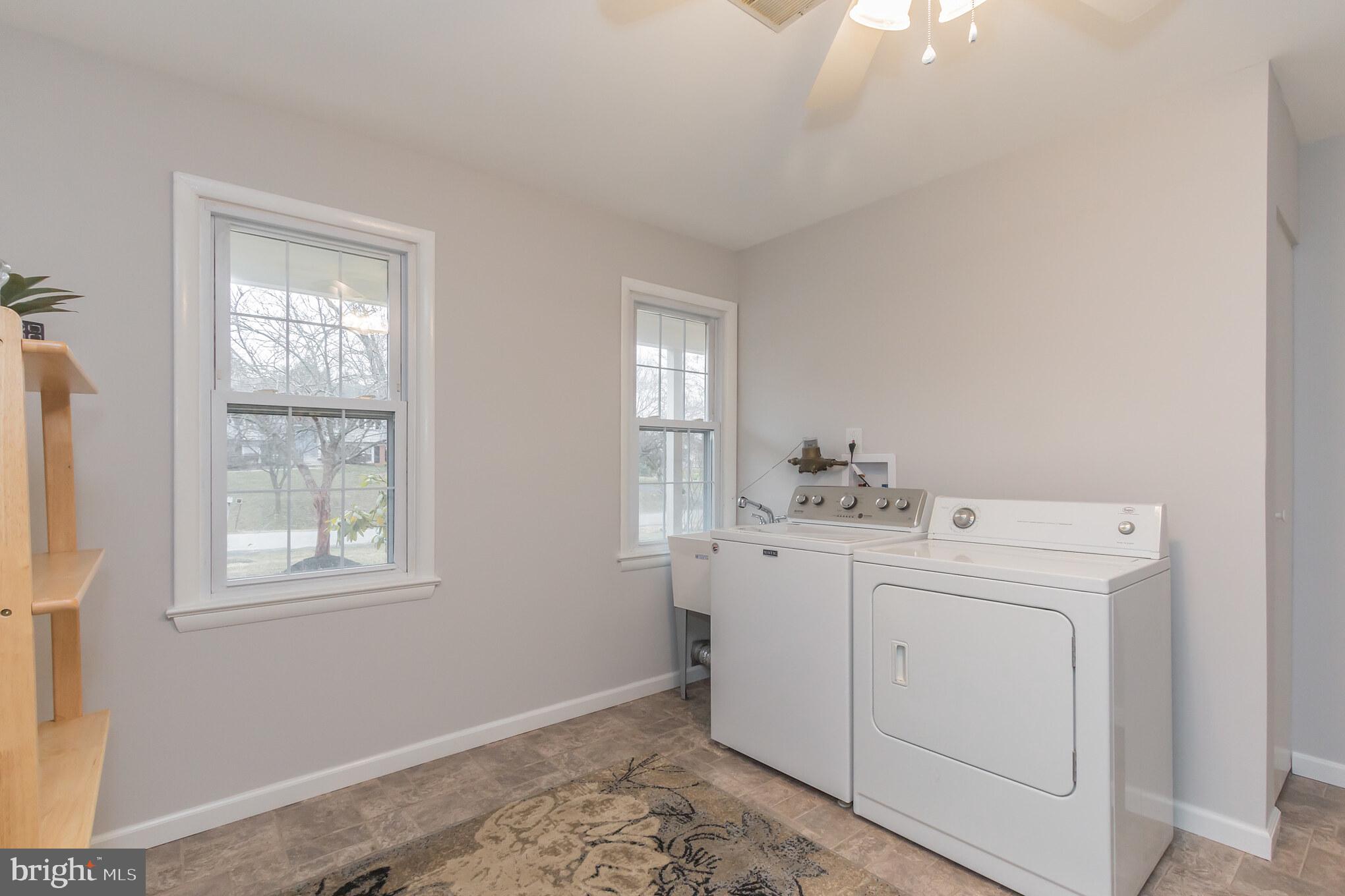 17120 Whites Road Poolesville, MD 20837 - Photo 24 of 30 a utility room with dryer and washer