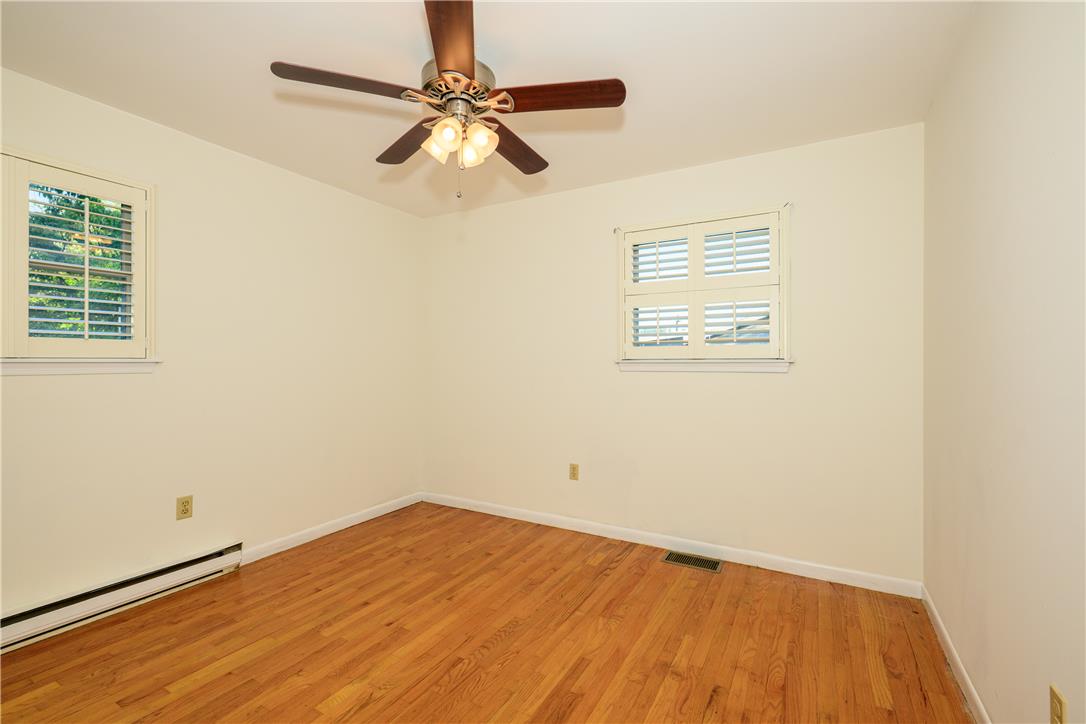 1644 9th Street Bethlehem, PA 18020 - Photo 12 of 27 Hardwood floors and bright windows define this inviting, comfortable bedroom.