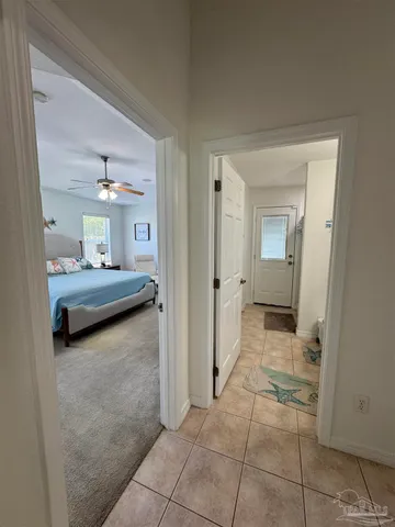 a view of a bedroom with closet area