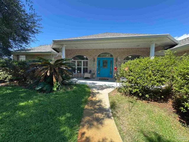 a front view of house with yard