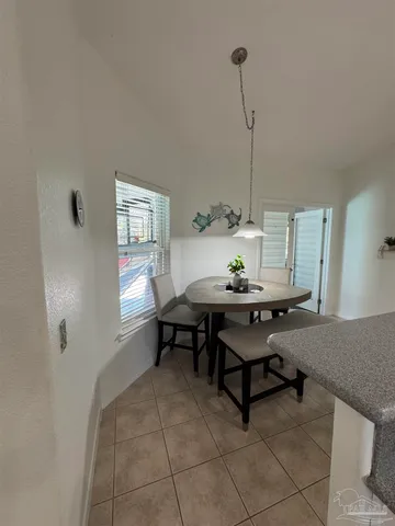 a living room with furniture and window