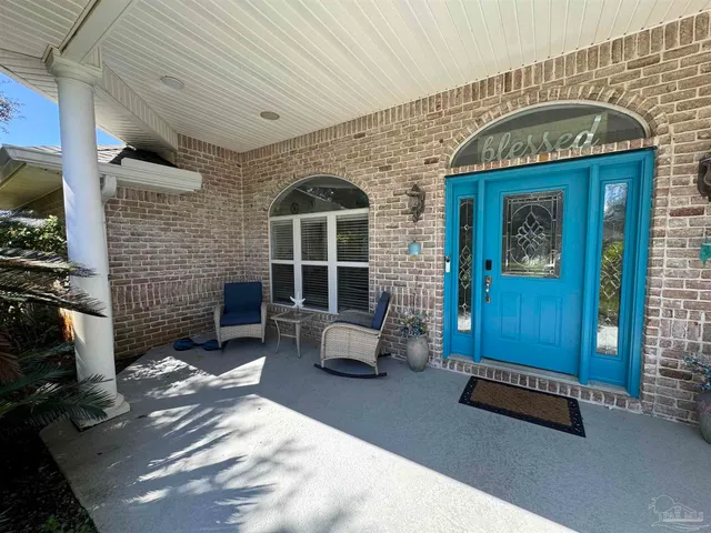 a front view of a house with parking