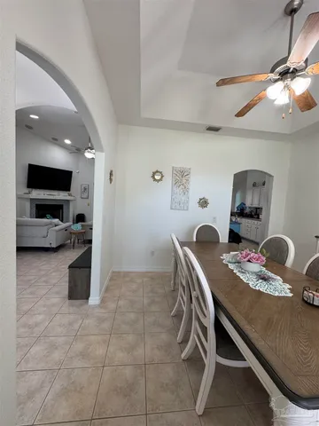 a room with furniture and a flat screen tv