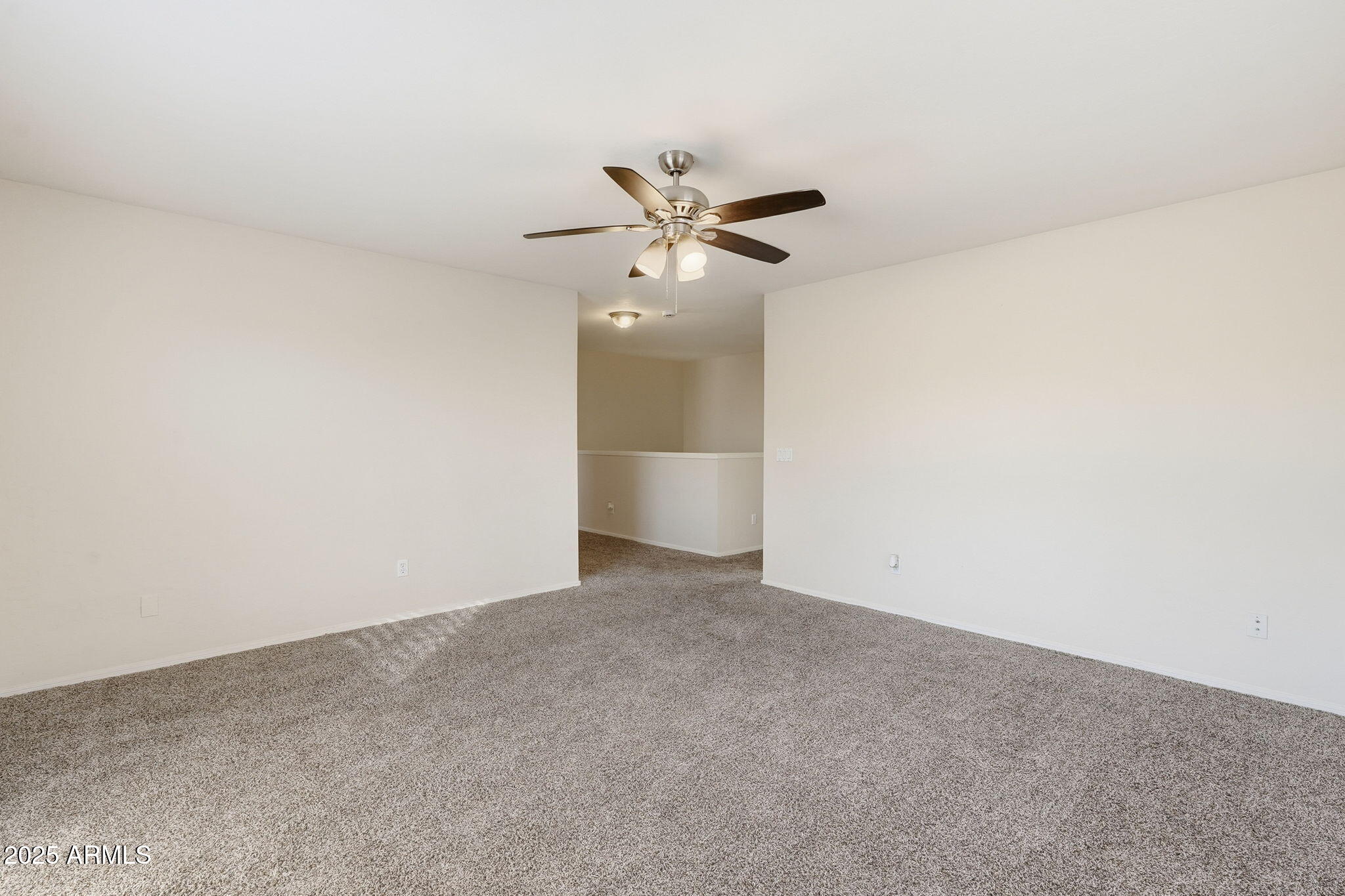 6782 West Rowel Road Peoria, AZ 85383 - Photo 10 of 42 a view of an empty room