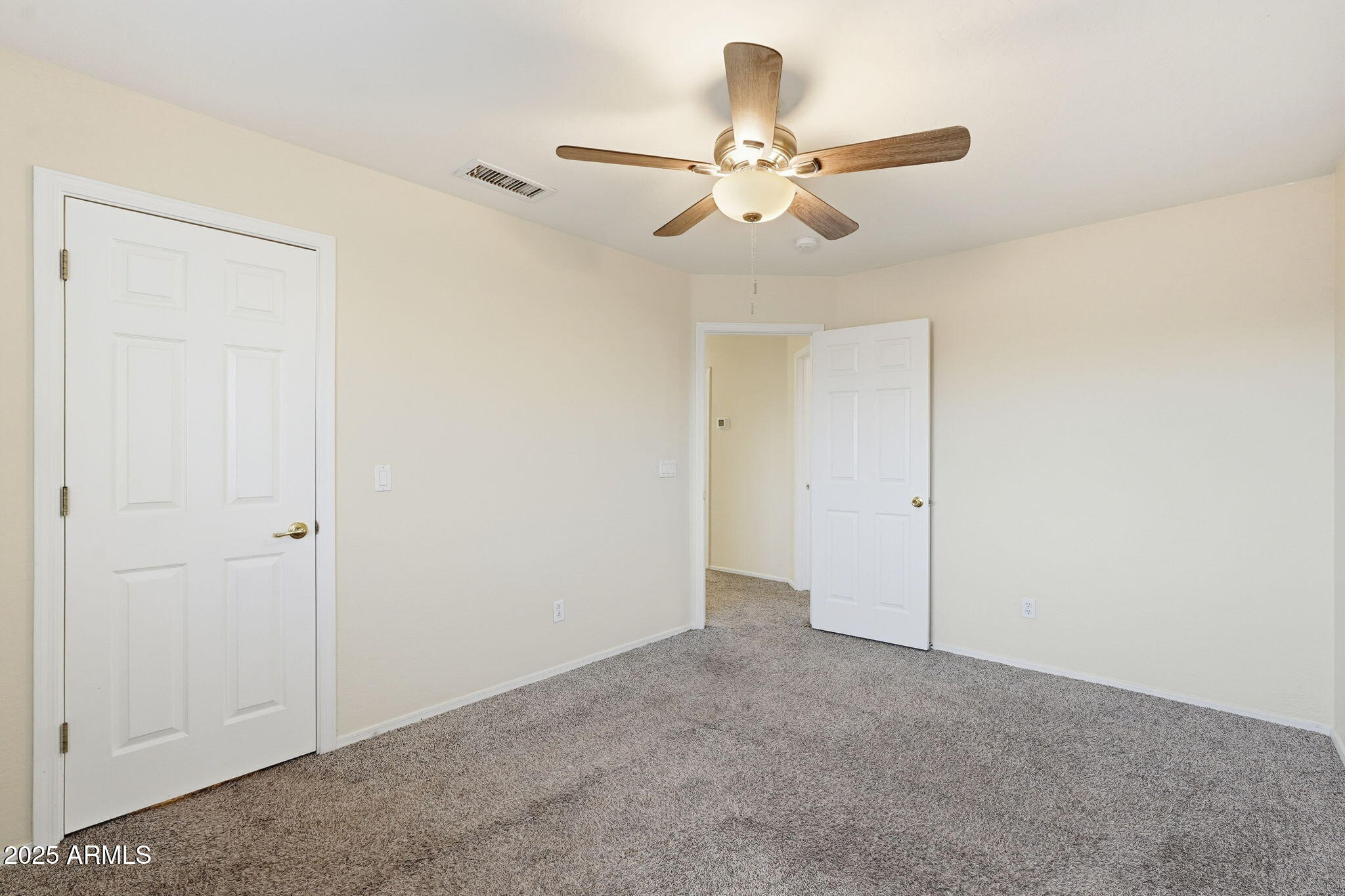 6782 West Rowel Road Peoria, AZ 85383 - Photo 30 of 42 a view of a livingroom with a ceiling fan