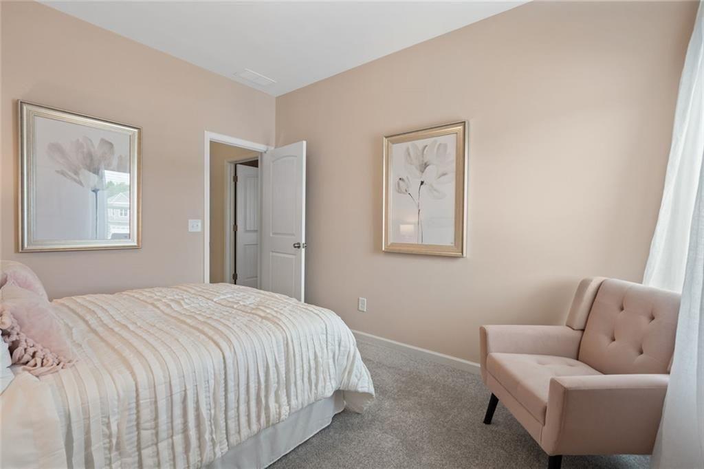 701 Sinclair Lane Temple, GA 30179 - Photo 29 of 46 a bedroom with furniture and a window