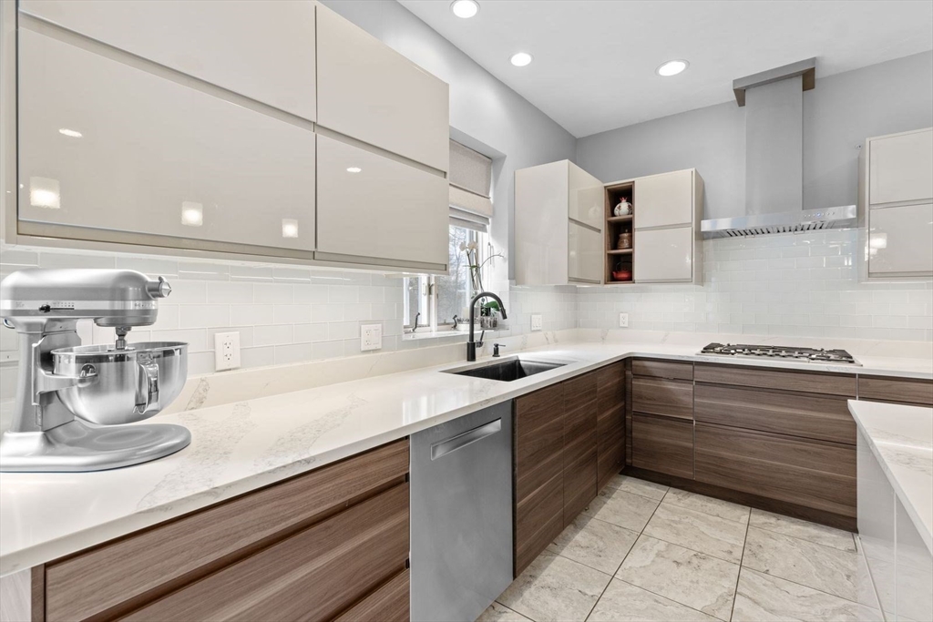 5 Sullivan Way Canton, MA 02021 - Photo 13 of 40 a kitchen with a sink and cabinets