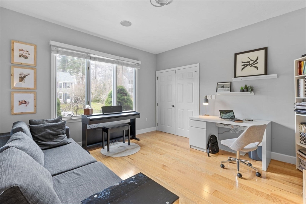 5 Sullivan Way Canton, MA 02021 - Photo 19 of 40 a living room with furniture and a window