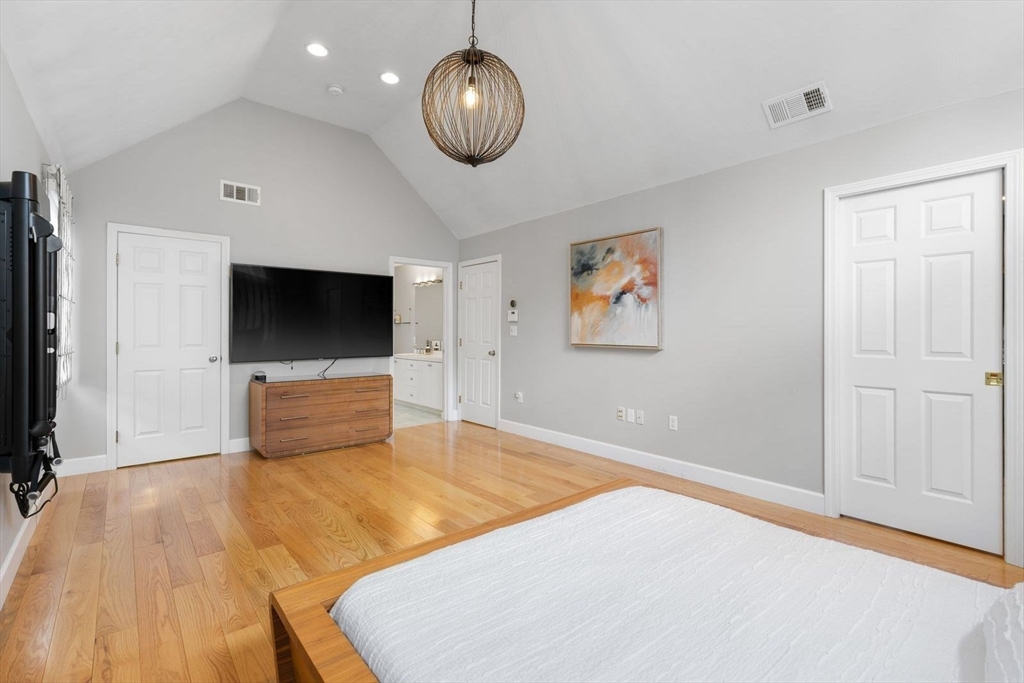 5 Sullivan Way Canton, MA 02021 - Photo 26 of 40 a living room with a flat screen tv and a bathtub