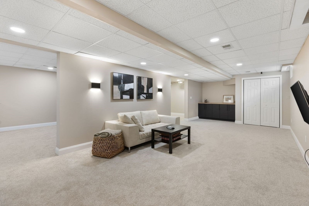 5 Sullivan Way Canton, MA 02021 - Photo 33 of 40 a bed room with furniture and night stand