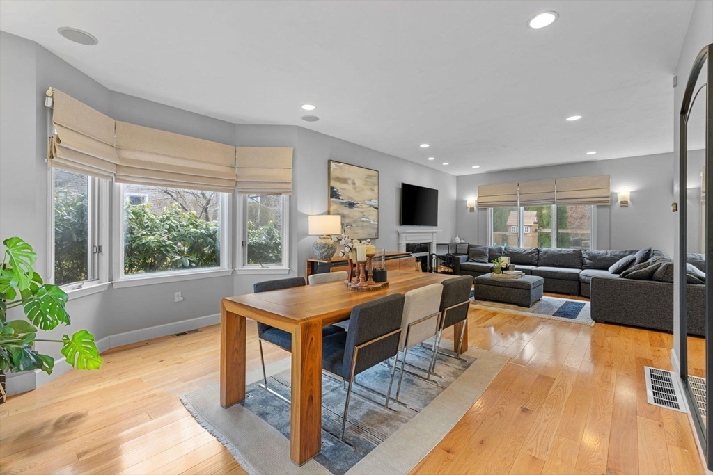 5 Sullivan Way Canton, MA 02021 - Photo 4 of 40 a view of a dining hall with furniture window and wooden floor