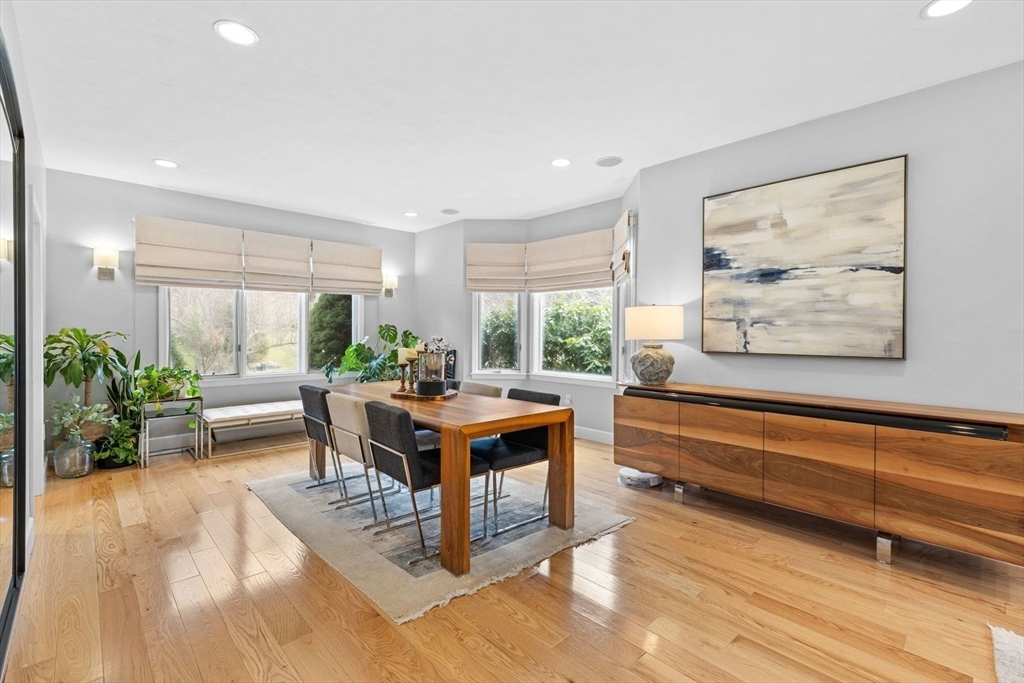 5 Sullivan Way Canton, MA 02021 - Photo 6 of 40 a view of a dining room with furniture window and wooden floor