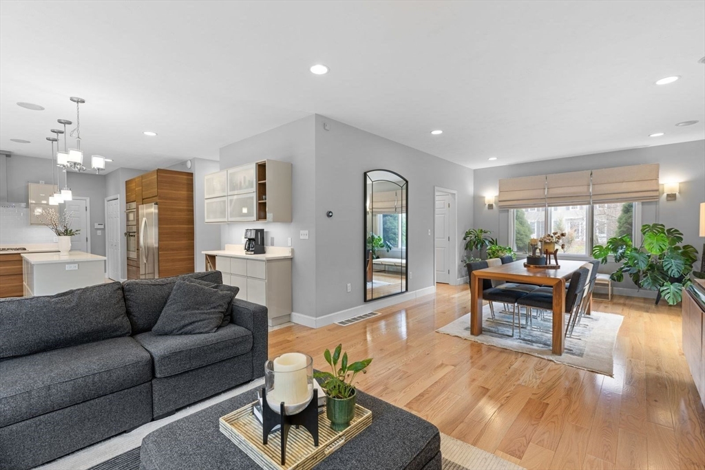 5 Sullivan Way Canton, MA 02021 - Photo 9 of 40 a living room with furniture and a wooden floor