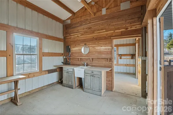 a kitchen with stainless steel appliances granite countertop a stove and a refrigerator