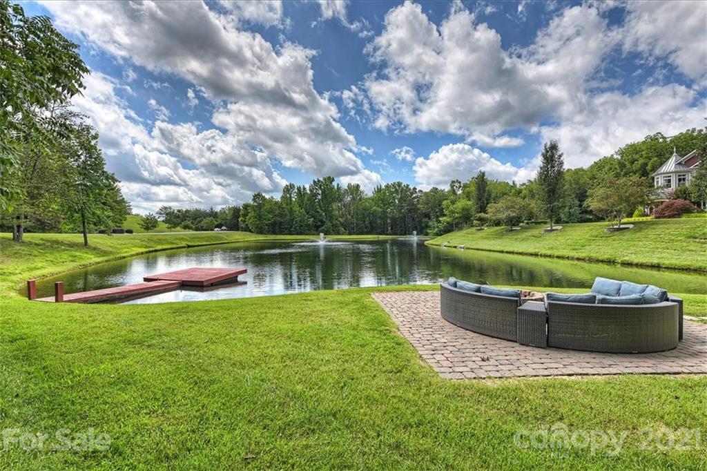 3211 Trinity Church Road Concord, NC 28027 - Photo 3 of 48 a view of a lake with a big yard