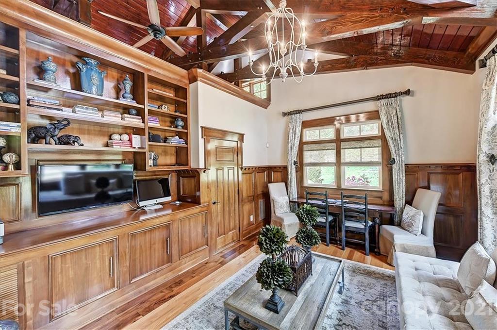 3211 Trinity Church Road Concord, NC 28027 - Photo 23 of 48 a living room with furniture and a flat screen tv