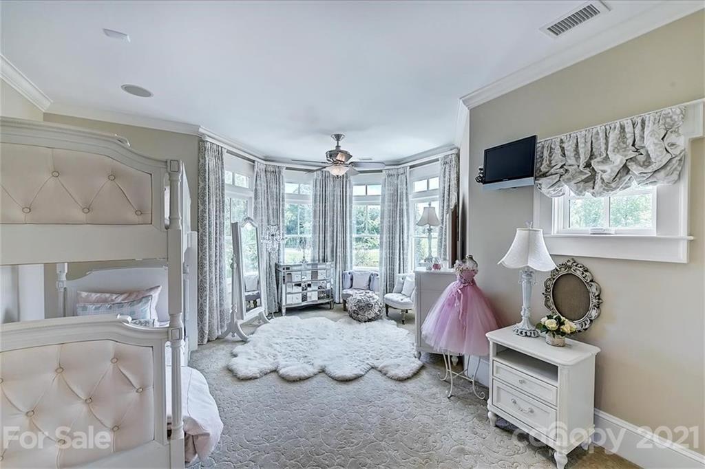 3211 Trinity Church Road Concord, NC 28027 - Photo 37 of 48 a bedroom with furniture and a window