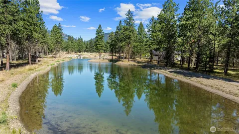 a view of swimming pool with a yard