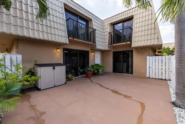 a view of a house with a street