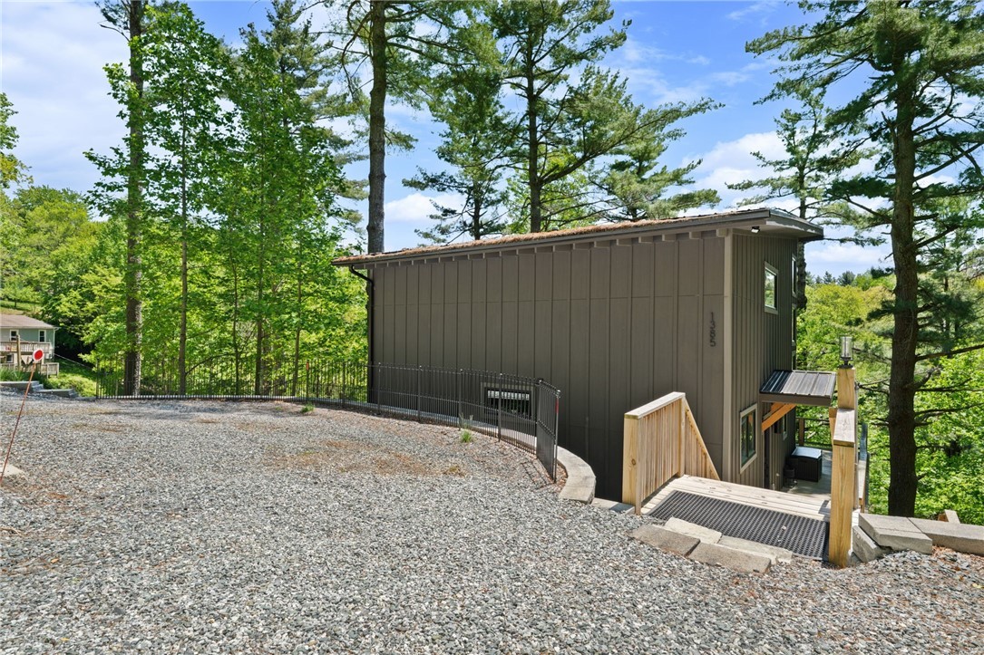 1385 Niley Cook Road Blowing Rock, NC 28605 - Photo 39 of 40 a backyard of a house with lots of green space