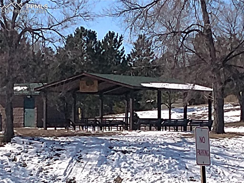 476 Elbert Street Elizabeth, CO 80107 - Photo 16 of 16 a view of a street with a bench