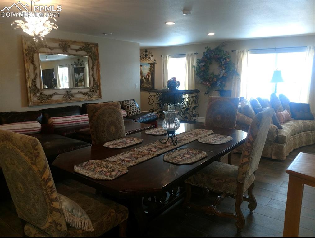 476 Elbert Street Elizabeth, CO 80107 - Photo 8 of 16 a view of a dining room with furniture