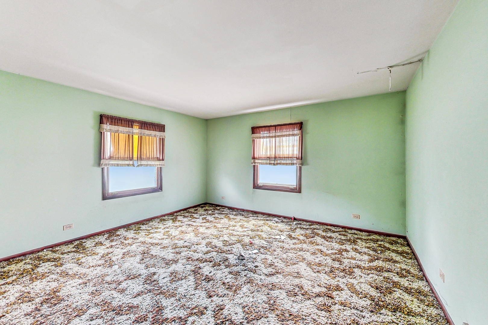 225 Herrick Road Riverside, IL 60546 - Photo 17 of 42 a view of an empty room and window