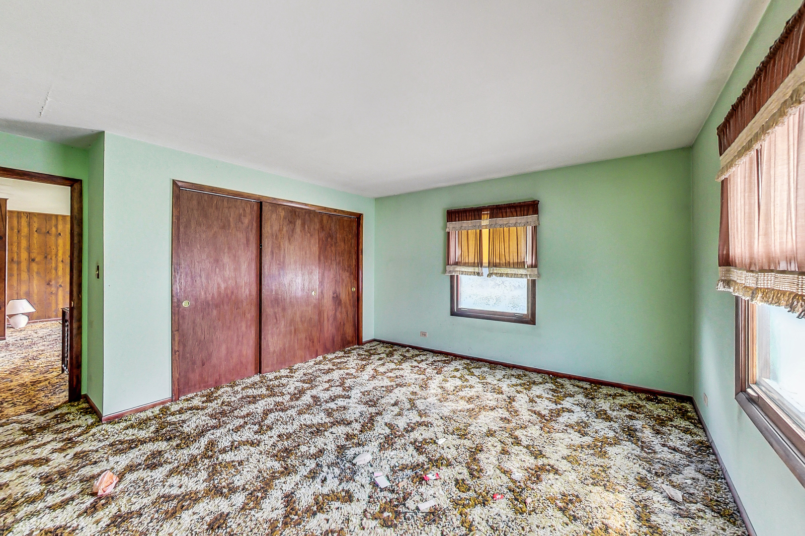 225 Herrick Road Riverside, IL 60546 - Photo 18 of 42 a view of a big room with windows and closet