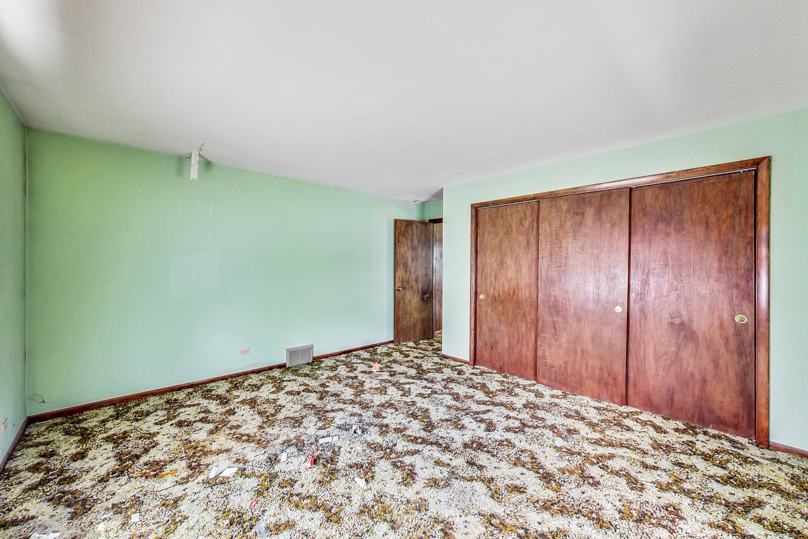 225 Herrick Road Riverside, IL 60546 - Photo 19 of 42 a view of a big room with a wooden door