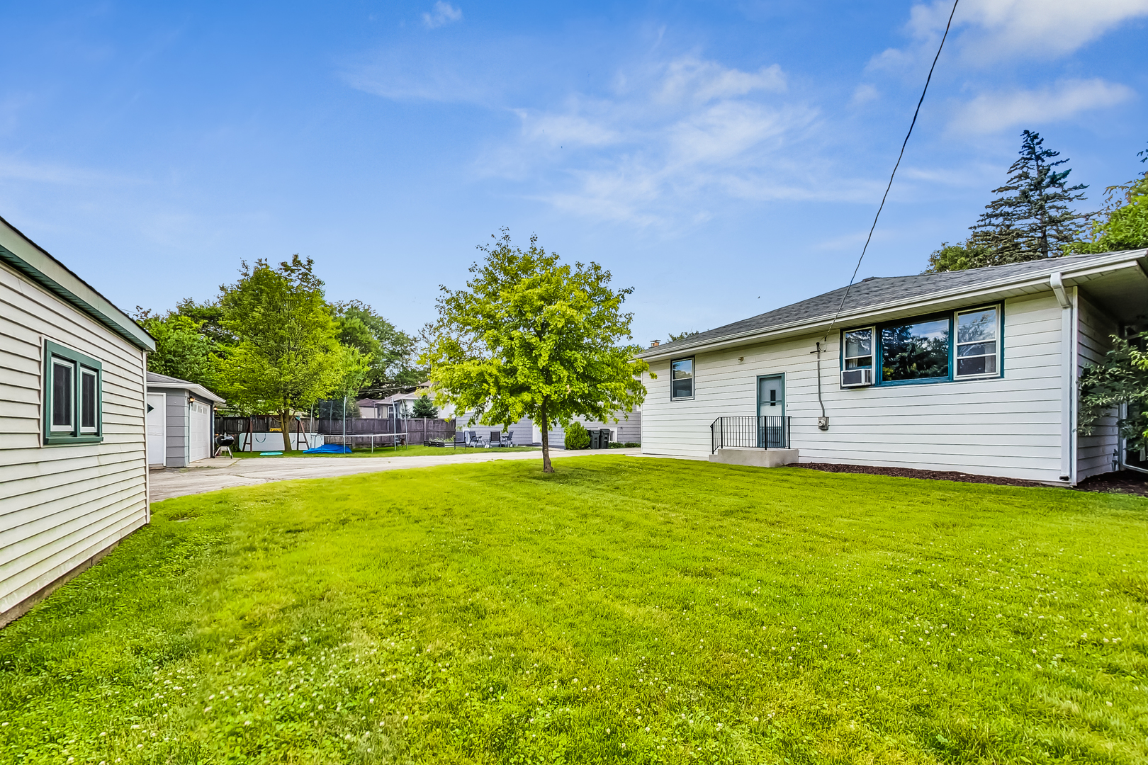 225 Herrick Road Riverside, IL 60546 - Photo 35 of 42 a house view with a garden space