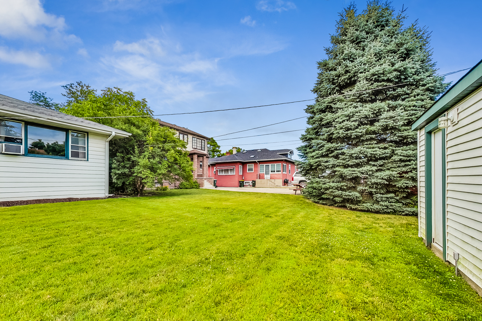225 Herrick Road Riverside, IL 60546 - Photo 36 of 42 a view of a house with a yard