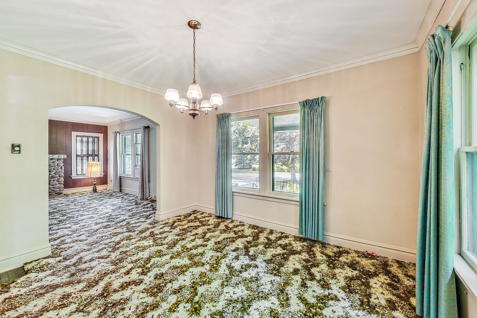 225 Herrick Road Riverside, IL 60546 - Photo 8 of 42 a view of a windows and chandelier in a room