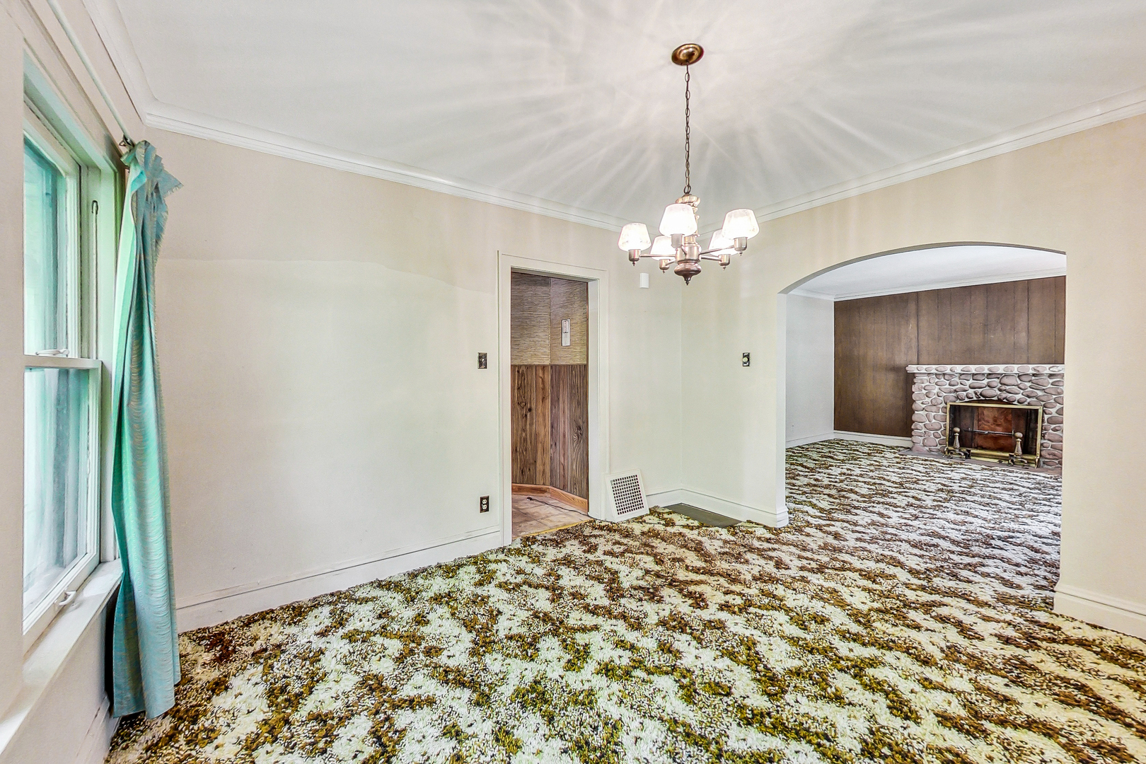 225 Herrick Road Riverside, IL 60546 - Photo 10 of 42 a bedroom with a bed and a chandelier