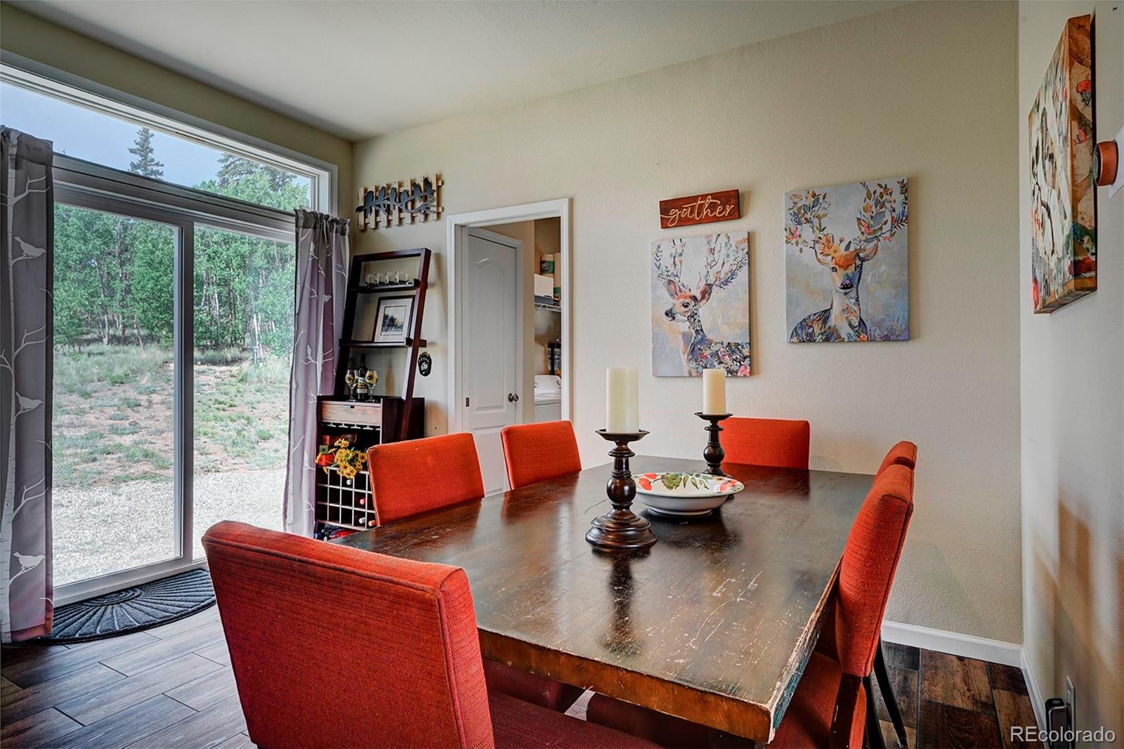 142 Long Rifle Way Como, CO 80432 - Photo 11 of 24 a living room with furniture and a window