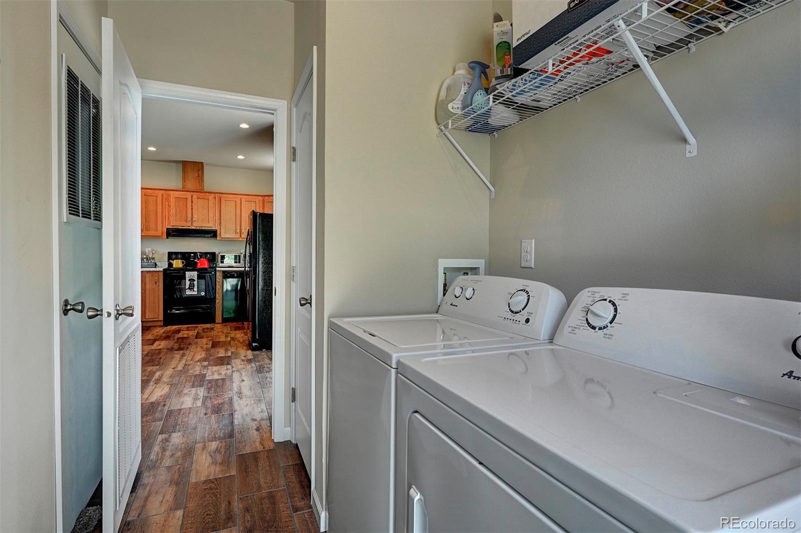 142 Long Rifle Way Como, CO 80432 - Photo 12 of 24 a utility room with dryer and washer