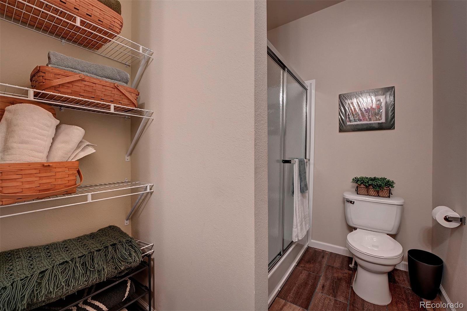142 Long Rifle Way Como, CO 80432 - Photo 16 of 24 a toilet sitting next to a bathroom sink